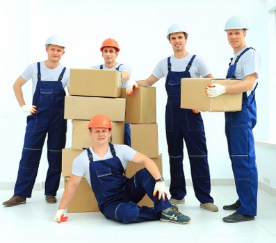 Man And A Van Watford team preparing a safe move with protective equipment