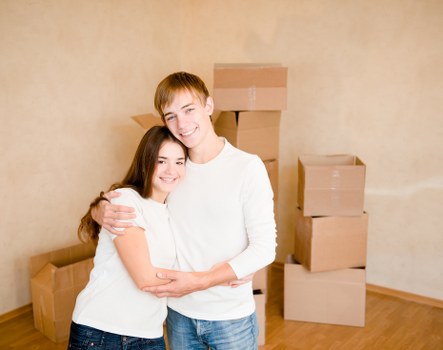 Local movers carrying household furniture during a Watford relocation