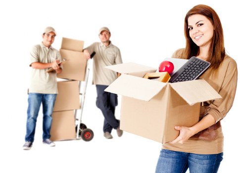 Removal team loading household items for a move in Watford