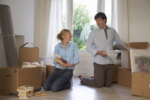 Packing boxes and fragile items for a house move in Watford
