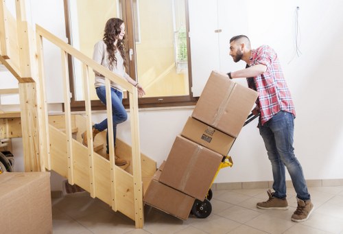 Transport team handling furniture during a house move